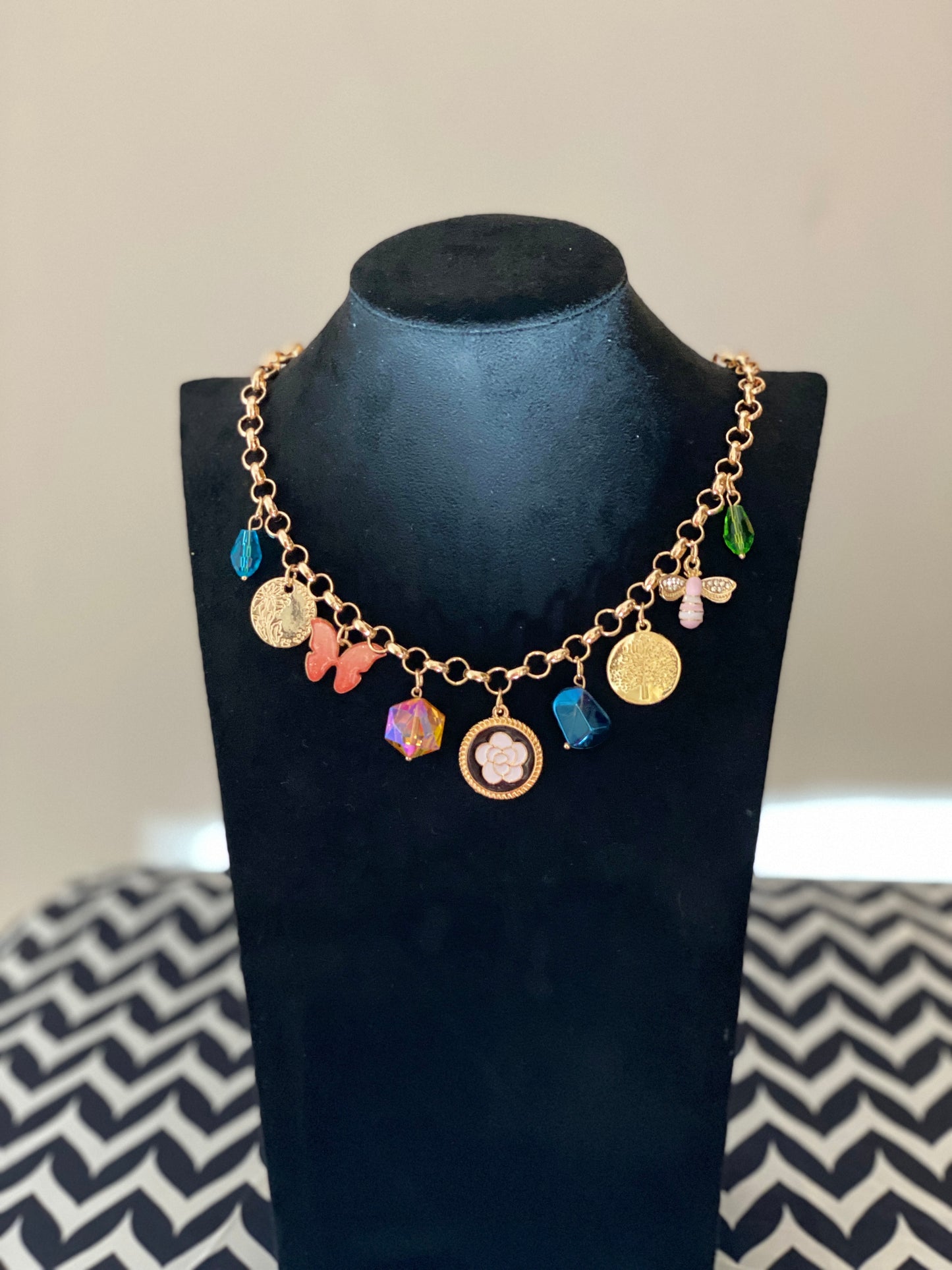 Channel charm necklace